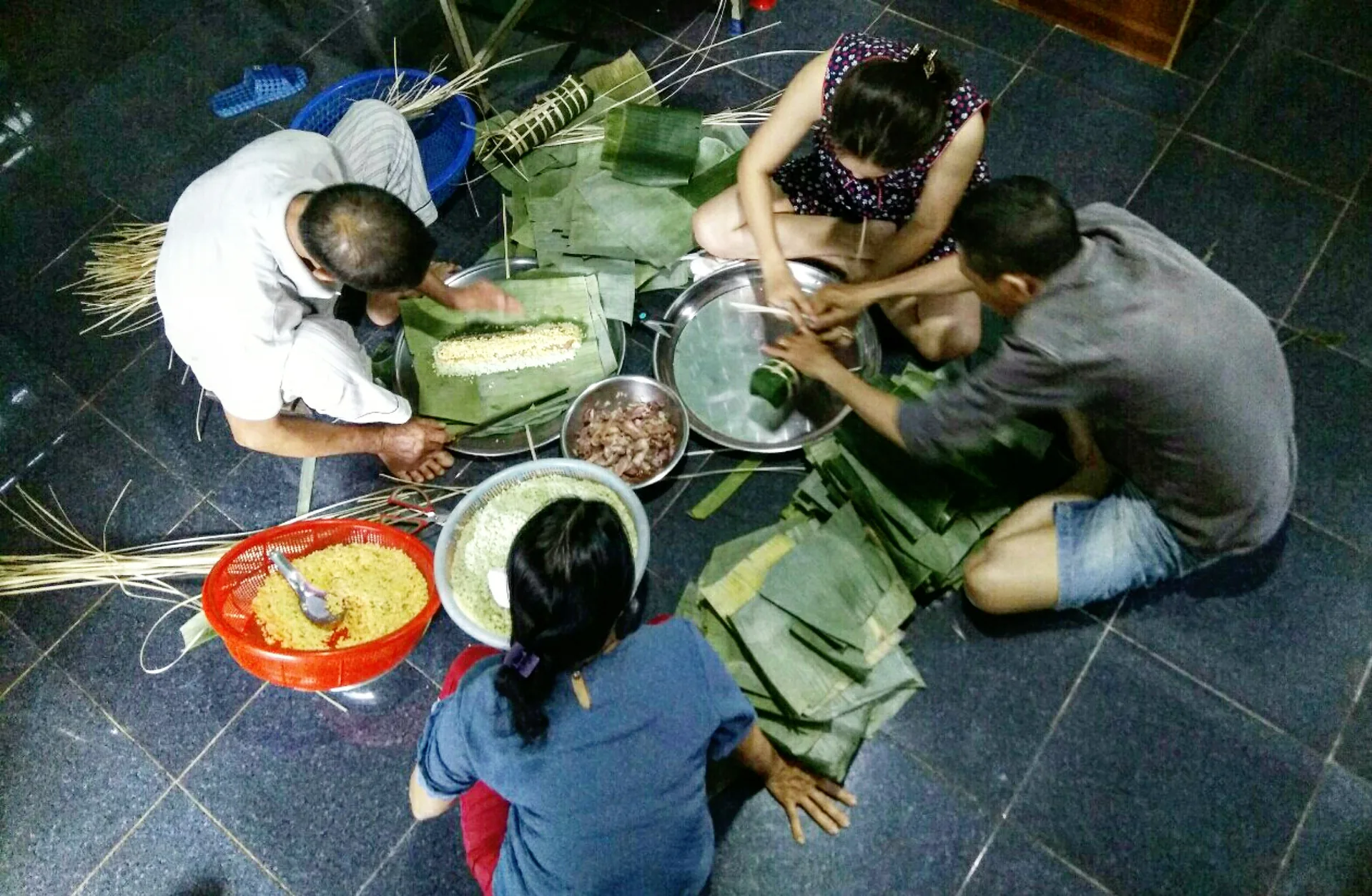 Bánh chưng sticky rice cake — the essential Tết food, wrapped in banana leaves and boiled overnight