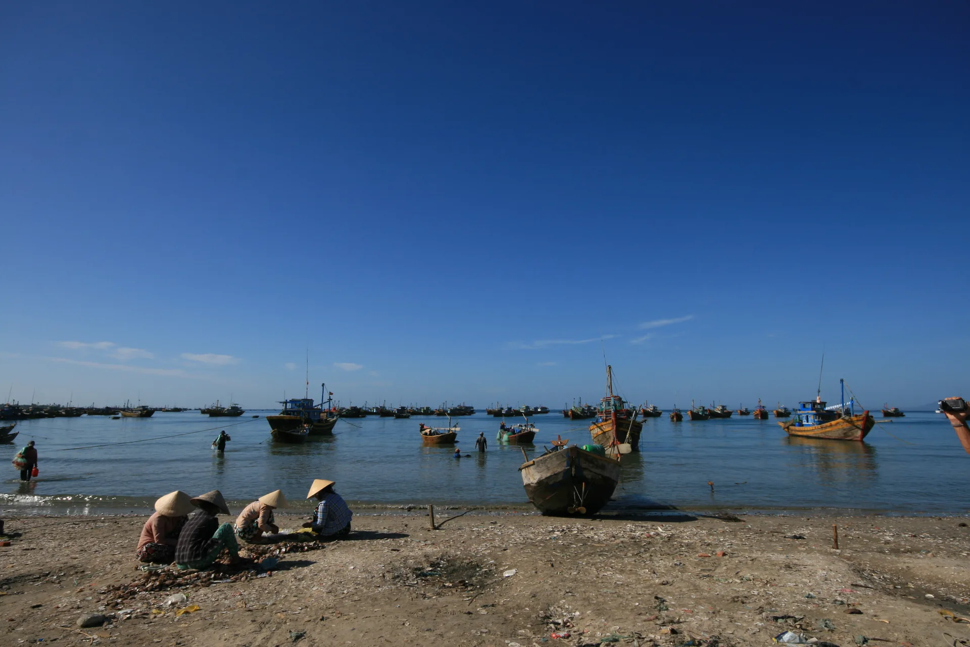 Mui Ne fishing village Vietnam — colorful boats crowd the harbor in one of the country's most photographed fishing communities