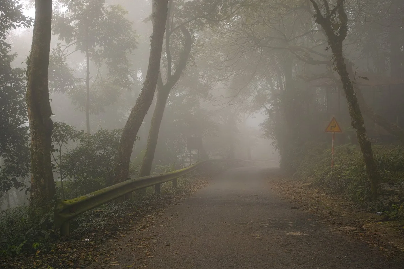 Misty forested peaks of Ba Vi National Park near Hanoi, Vietnam