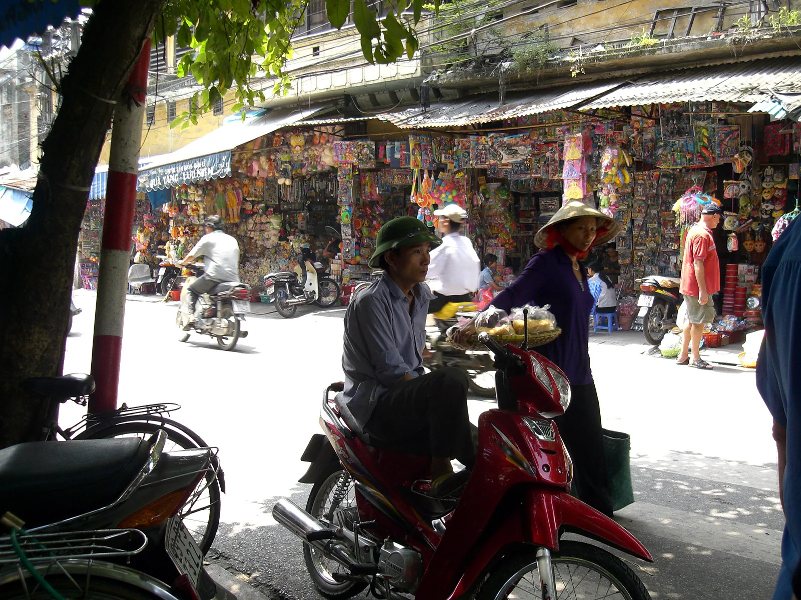 Hanoi Old Quarter street Vietnam — the French-Vietnamese streetscape of Hanoi's Old Quarter is one of Asia's most distinctive urban environments