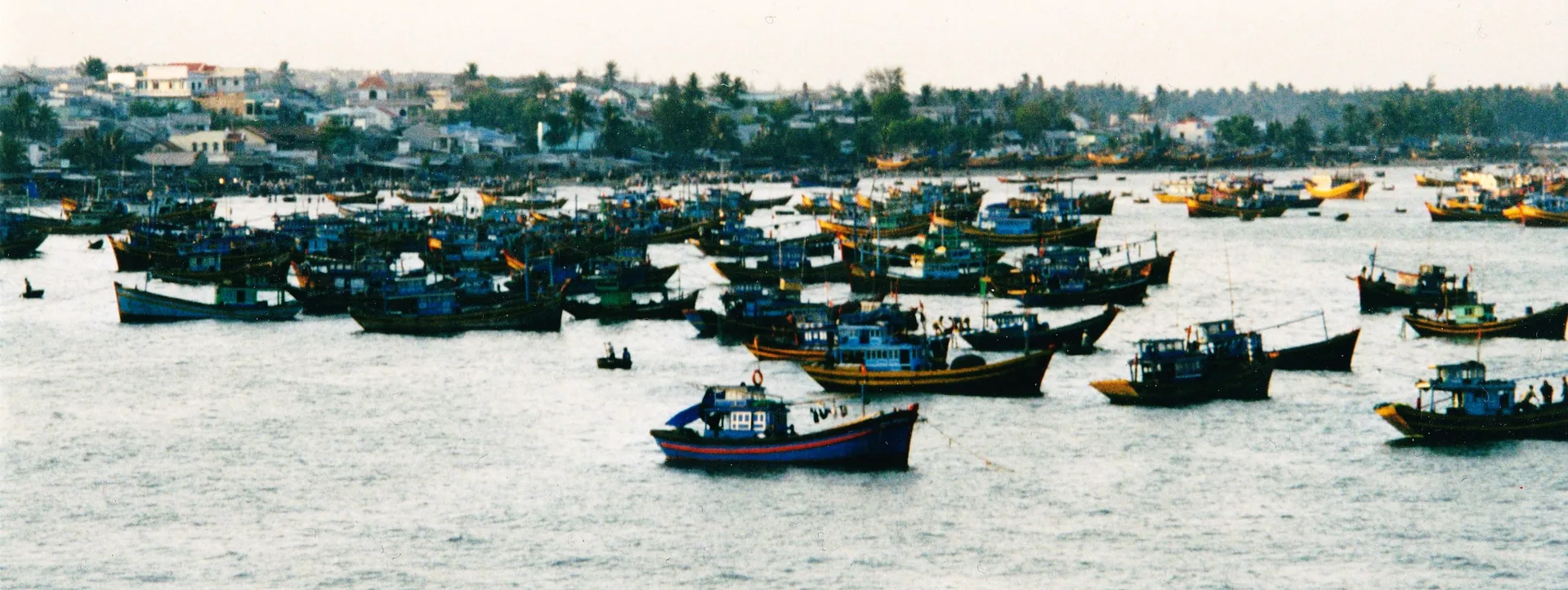 Mui Ne fishing village Vietnam colourful boats