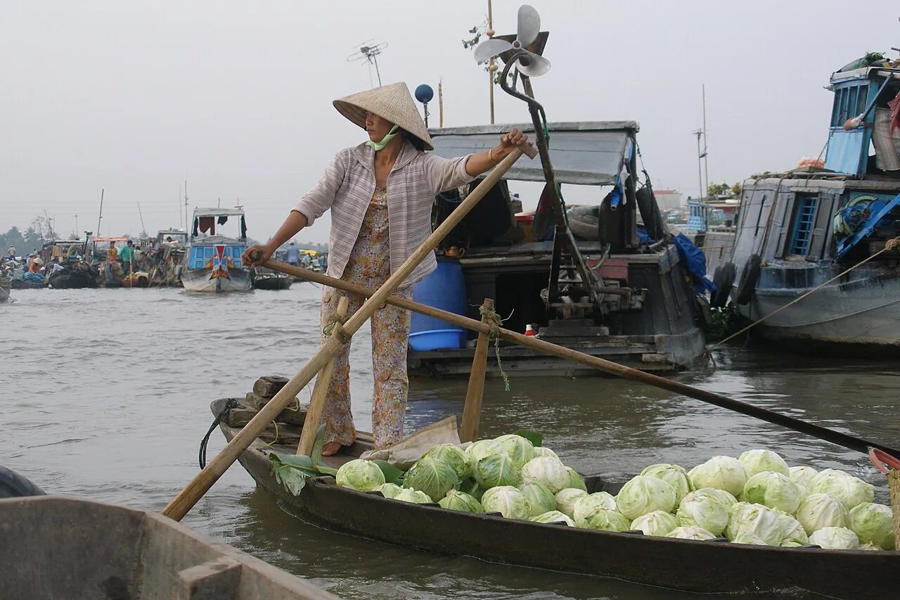The Cai Rang floating market at dawn — the Mekong Delta's most iconic scene