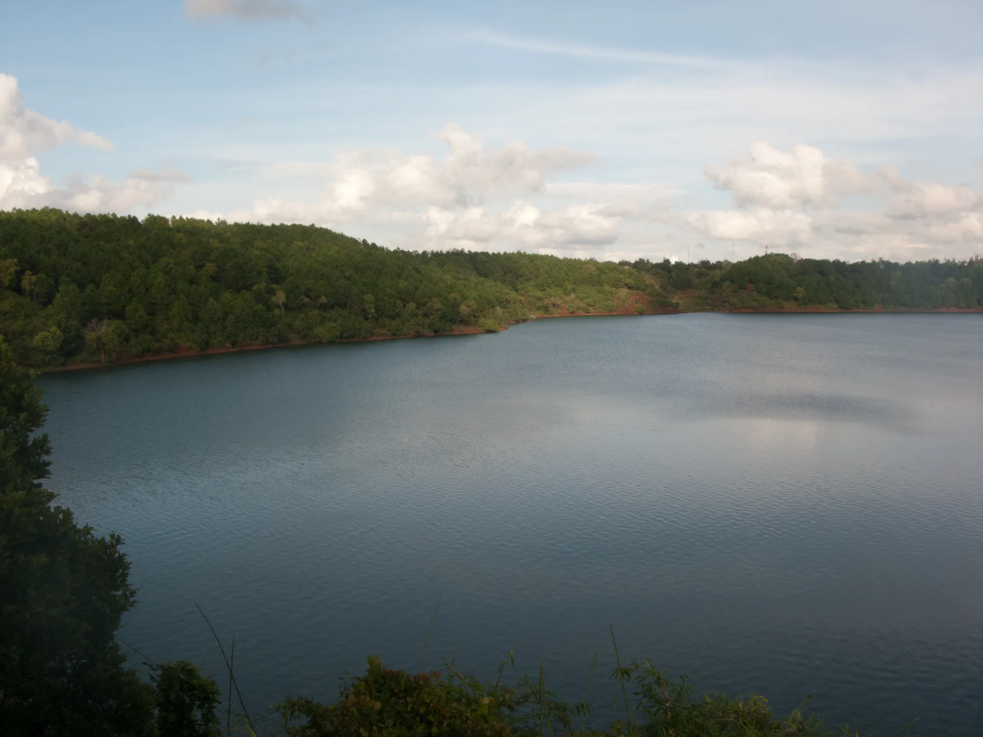 Bien Ho crater lake near Pleiku — a highland reward on the Central Highlands motorbike loop